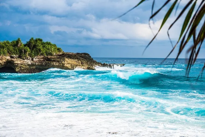Waves on the cliffs of a Bali island